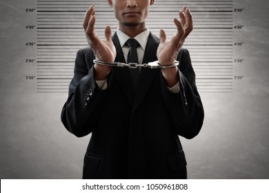 Businessman In Handcuffs