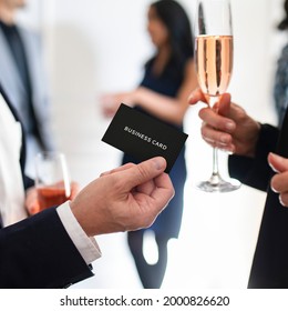 Businessman handing over a business card mockup