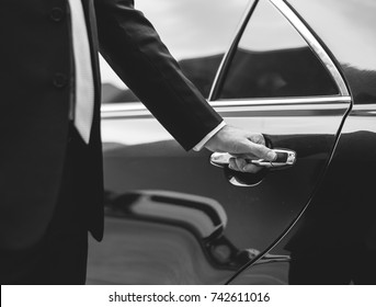 Businessman Handle Limousine Door Car