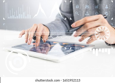 Businessman hands using tablet computer. Digital marketing media or financial diagrams in virtual screen. 3D chart floating above digital tablet computer screen. Modern smart technology in business