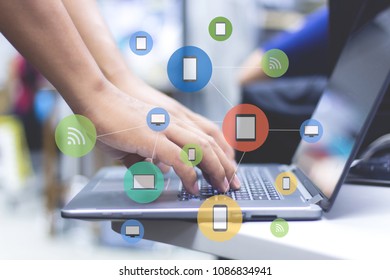 Businessman hands working with a Cloud Computing diagram devices and icons applications to a digital planet ,internet of things .