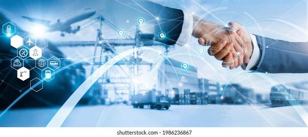
businessman handshake of business deal with logistic and transportation global network distribution on industrial container terminal, export and import. 