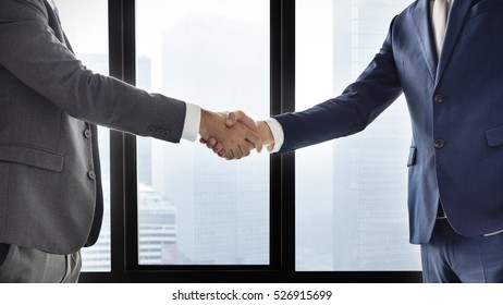 Businessman Handshake Corporate Colleagues Concept - Shutterstock ID 526915699