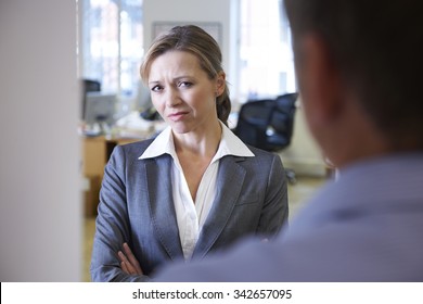 Businessman Harassing Female Colleague