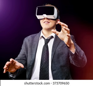 Businessman Has Fun Using His Virtual Reality VR Glasses Head Mounted Display