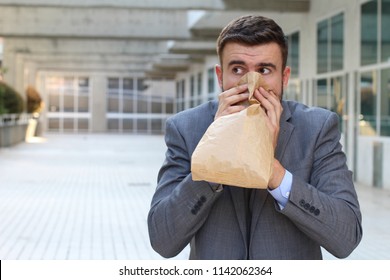 Businessman Having A Panic Attack