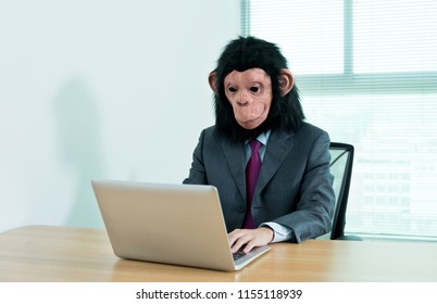 Businessman Head Monkey Using Laptop His Stock Photo 1155118939 ...