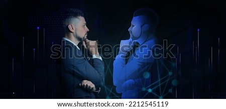 Businessman with his digital projection on dark background. Concept of digital twin