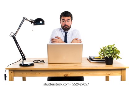 Businessman In His Office Freezing