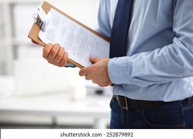 Businessman hold with clipboard