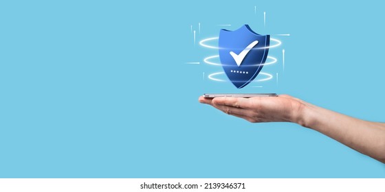 Businessman hold low poly polygon shield with a tick icon.Secure Access System Concept.Business Financial Warranty for Investment.antivirus concept.Technology security.Protection network,safe data - Shutterstock ID 2139346371