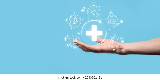 Businessman Hold Virtual Plus Medical Network Connection Icons. Covid-19 Pandemic Develop People Awareness And Spread Attention On Their Healthcare.Doctor,document,medicine,ambulance,patient Icon