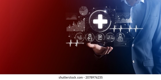 Businessman Hold Virtual Plus Medical Network Connection Icons. Covid-19 Pandemic Develop People Awareness And Spread Attention On Their Healthcare.Doctor,document,medicine,ambulance,patient Icon