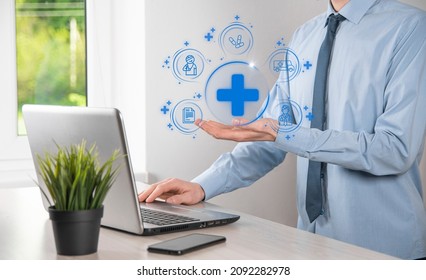 Businessman Hold Virtual Plus Medical Network Connection Icons. Covid-19 Pandemic Develop People Awareness And Spread Attention On Their Healthcare.Doctor,document,medicine,ambulance,patient Icon