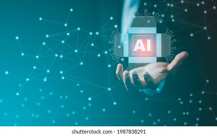 Businessman holding Artificial Intelligence (AI),on big data network machine learning and data on the dark background, artificial intelligence technology, innovation and futuristic. - Shutterstock ID 1987838291