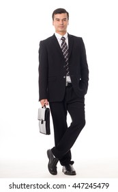 Businessman holding briefcase isolated with white background.