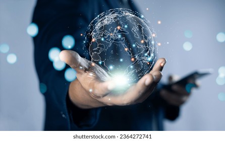 Businessman holding circle global network connection. Big data analytics and business intelligence concept. Digital link tech , business network communication and technology concept.