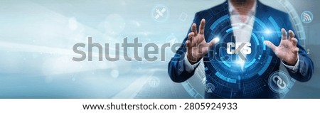 Businessman holding CPS interface with networking data, smart systems, IoT technology, industrial automation and digital control concept