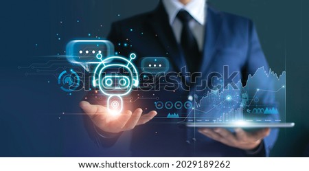 
Businessman holding digital chatbot are assistant conversation for provide access to data growth of business in online network, Robot application and global connection, AI, Artificial intelligence.