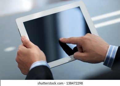 Businessman Holding Digital Tablet