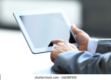 Businessman Holding Digital Tablet