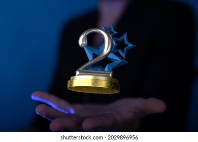 A Businessman Holding A Floating Digital 2nd Place Trophy