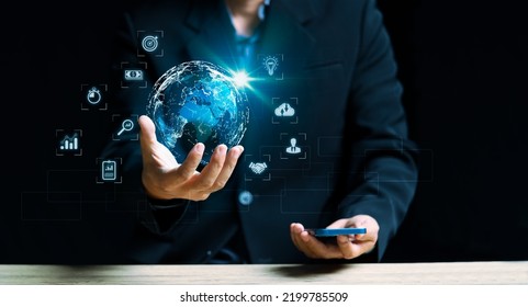 Businessman Holding The Global Digital Screen, Digital Layer Effect, Business Strategy Analytic Concept, Big Data, Cloud Computing, Security Computer Network,data-driven Organization.