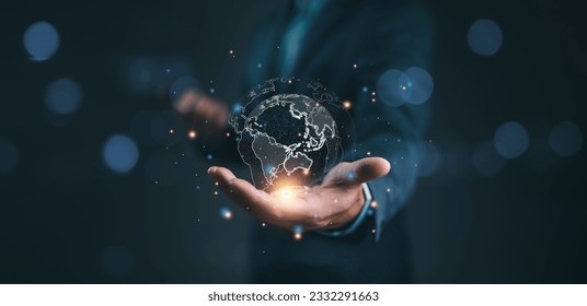 businessman holding Global network connection. Big data analytics and business intelligence concept. World map point and line composition concept of global business.Digital link tech. - Powered by Shutterstock