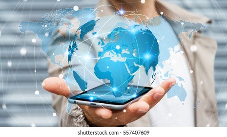 Businessman holding global network and data exchanges over his phone 3D rendering