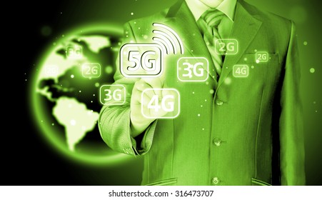 businessman holding in hand 5G, technology background - Shutterstock ID 316473707