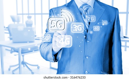businessman holding in hand 5G, technology background - Shutterstock ID 316476233