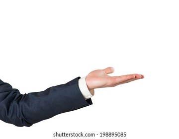 Businessman holding hand out in presentation on white background - Powered by Shutterstock