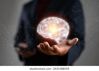 Businessman holding human brain and icon customer digital network with effective business mindset on paper texture background
