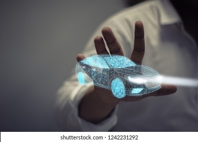 businessman holding icon car / Concept of car aftermarket service