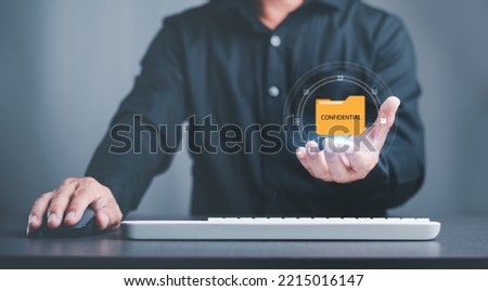 Businessman holding icon in hand, confidential document protection concept, business data file security, privacy folder, business-critical data lock, Document Management System Foto stock © 