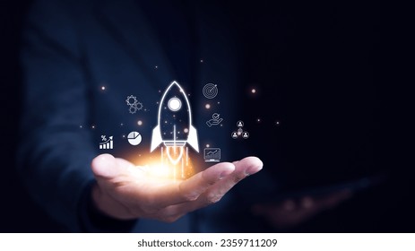 Businessman holding icons about business and investment, Rocketing take off with a targeted launch speed, Wealth fast, Graph depicting rising earning, increasing profits exemplifies financial success,