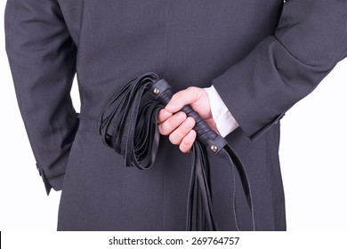 Businessman Holding A Leather Whip.