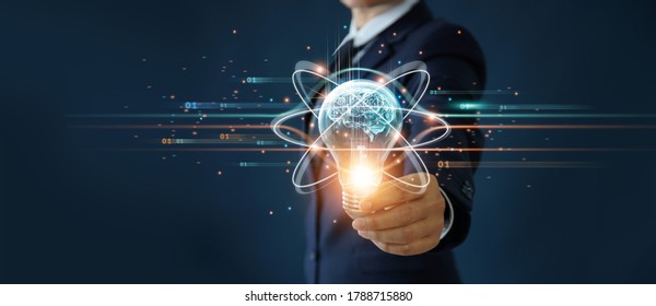 Businessman holding light bulb and brain inside, Idea and imagination, Creative and inspiration, Science innovation with network connection, Solution analysis and development, Innovative technology.