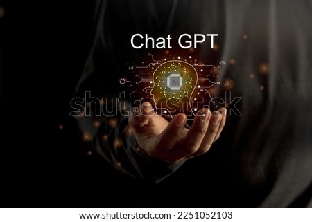 Businessman holding a light chatbot hologram  intelligence AI. Chat GPT chat with AI Artifice intelligent developers by OpenAI generate. 
