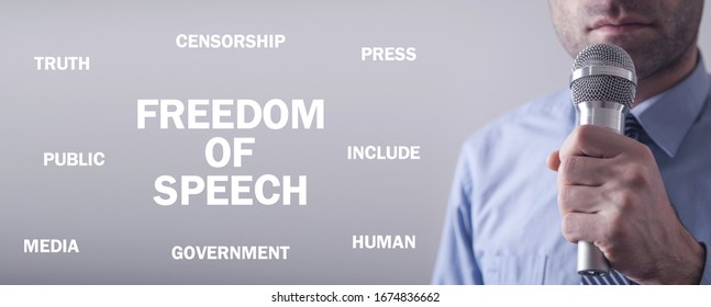 Businessman Holding Microphone. Freedom Of Speech