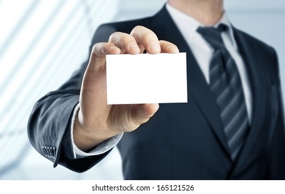 Businessman Holding Paper Visit Card