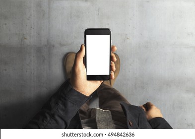 Businessman Holding Phone