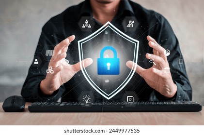 Businessman holding shield protect icon. Protection network security computer and safe your data concept, lock symbol, concept about security, cybersecurity and protection against dangers.