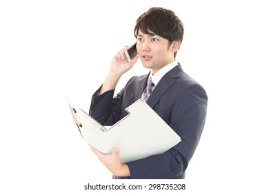 Businessman holding a smart phone 