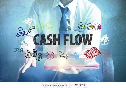 Businessman Holding A Tablet Computer With CASHFLOW Text ,business Concept 