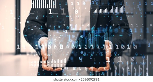 Businessman holding tablet with digital data, binary code, and analytics on abstract background. Concept of technology, online business, and big data