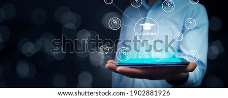 Businessman holding a tablet pc with 