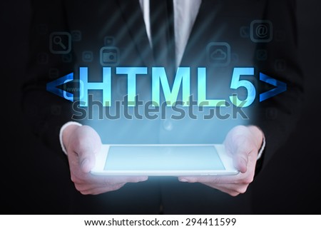 Businessman holding a tablet pc with 