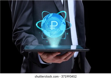 Businessman holding tablet with a projected on-screen icon online trading ruble. business Internet concept. - Shutterstock ID 371993452