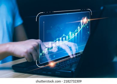 Businessman Holding Tablet And Showing Hologram Graph And Stock Market Statistics Earn Profit. Business Planning And Strategy, Forex Trading Analysis. Stock Market, Growth Finance